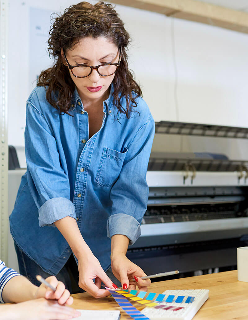 Woman Selecting Color Palette for Design Project